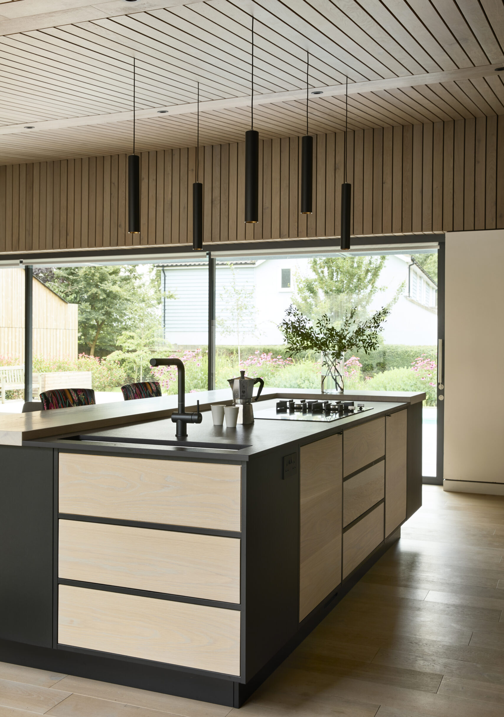 Contemporary kitchen with blend of materials and clean lines