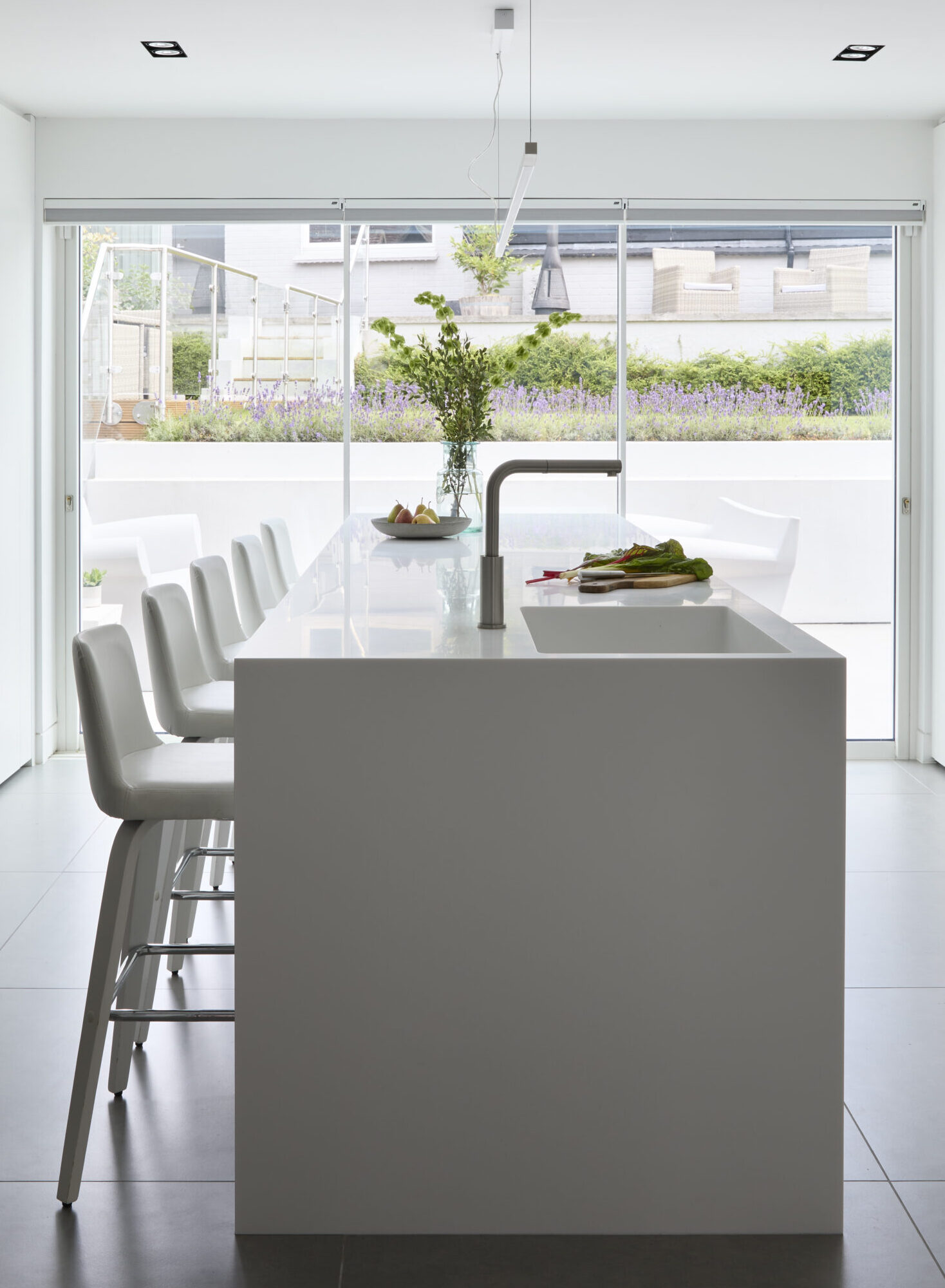 Sleek modern kitchen with handleless design and minimalist aesthetic