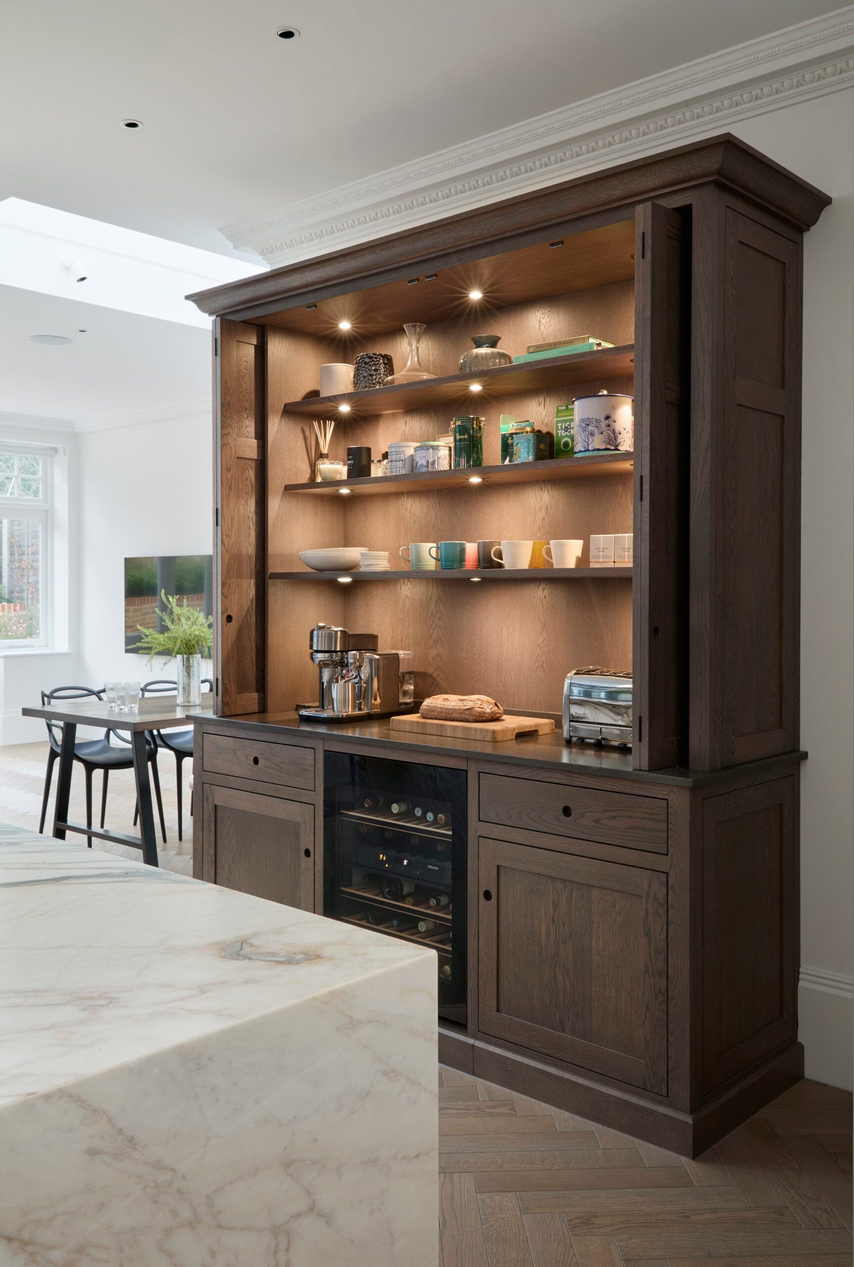Backlit breakfast pantry shelving in dark oak at Victoria Road