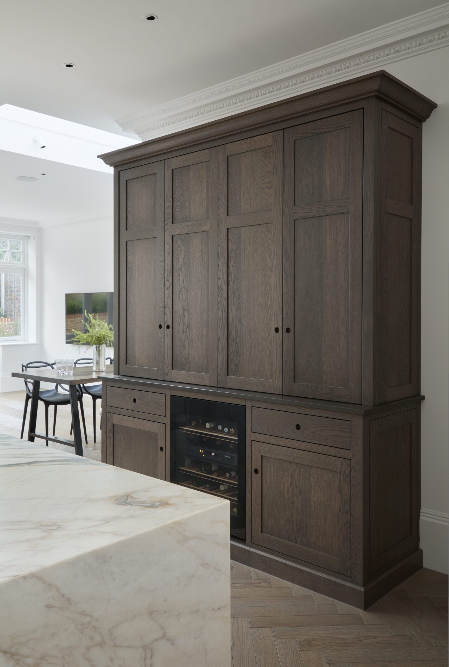 Dark oak breakfast pantry with doors closed at Victoria Road