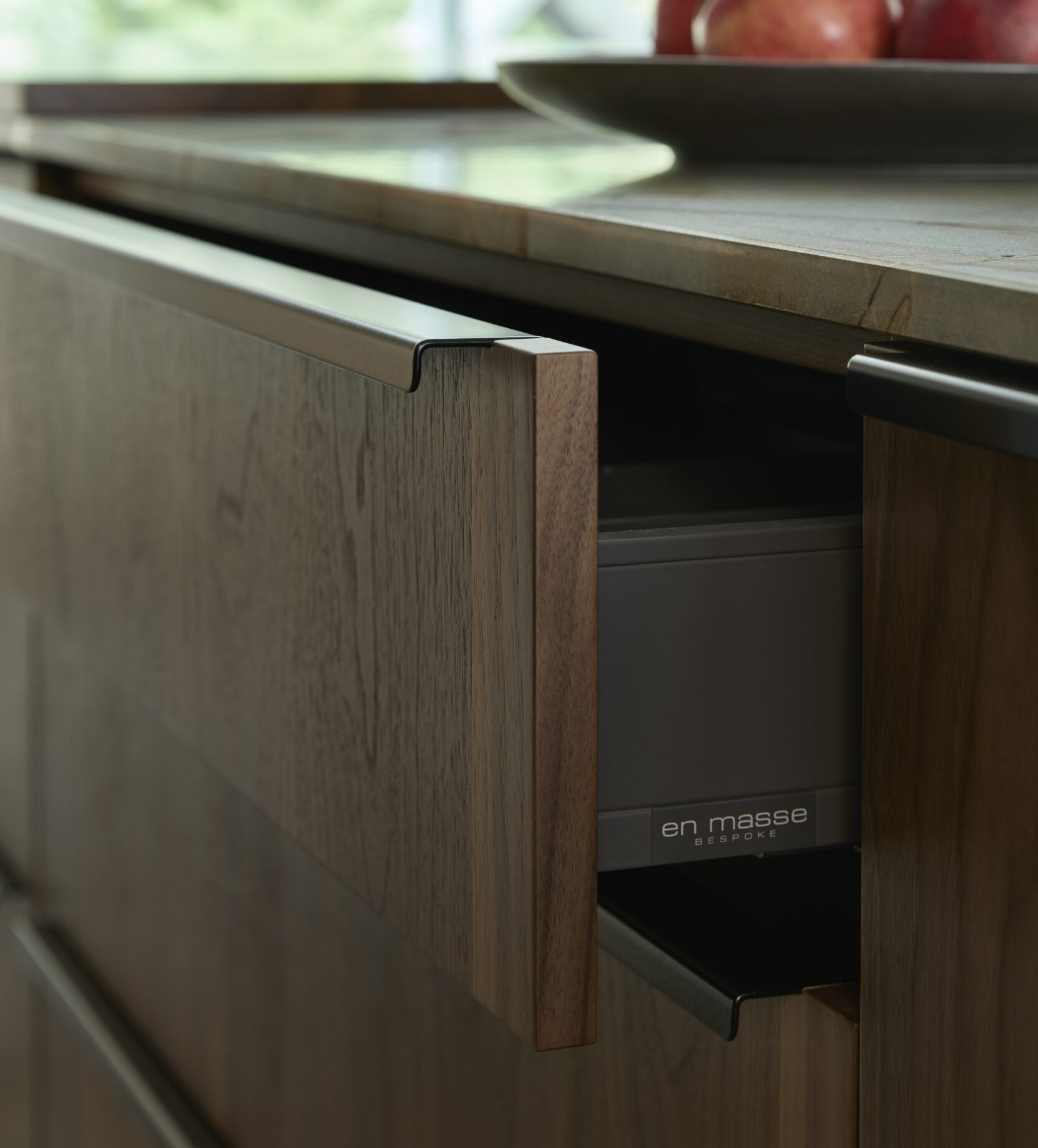 Detailed view of a custom wine storage solution in a luxury bespoke kitchen.